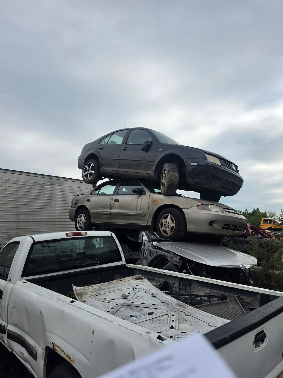 Stacked cars ready for a Radicals mobile car smash