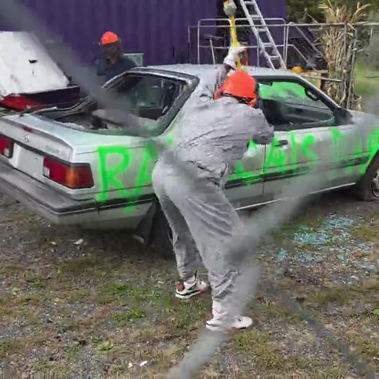Guest smashing a car at Radicals Car SMASH, Quakertown PA