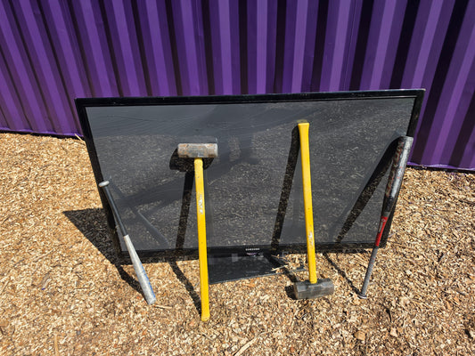 Large TV with sledgehammers, Premium TV smash add-on at Radicals Rage Rooms