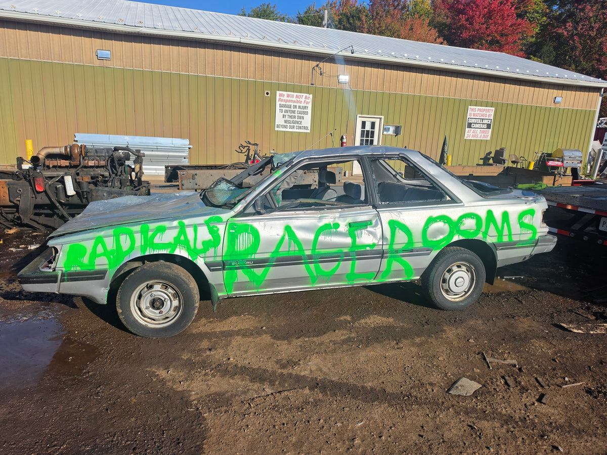 Car painted with the Radicals Rage Rooms logo ready to smash