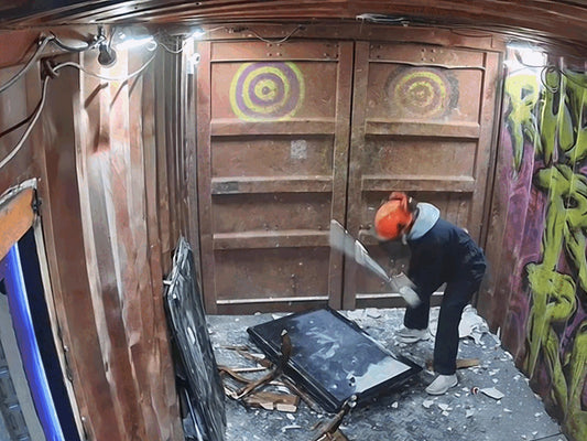 Guest smashing a TV in a Radicals Rage Rooms rage room, video footage add-on